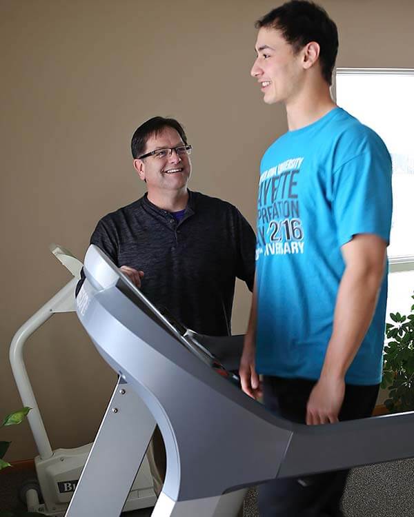 Image of patient receiving sports therapy treatment on a treadmill Sports Therapy Image
