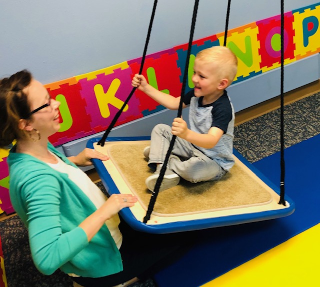 Image of Taylor Physical Therapy's therapist with peds patient Physical Therapist Kristin Kahler