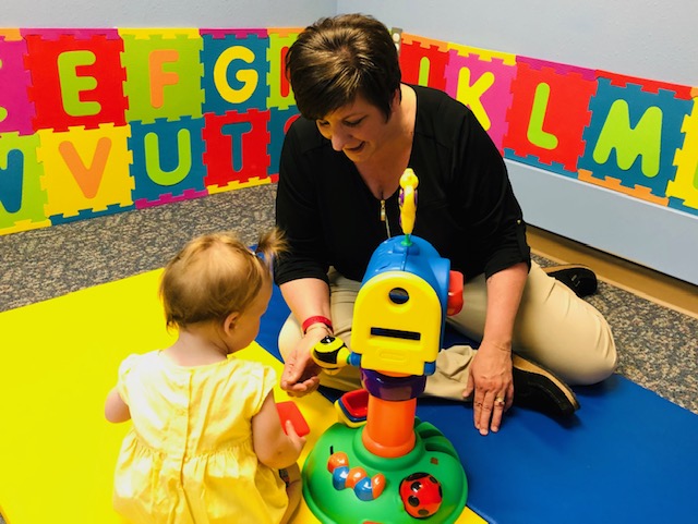 Image of Taylor Physical Therapy's therapist with peds patient Physical Therapist Kristin Kahler